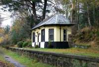 The former station at Cambus O' May on the Deeside line, closed along with the line in February 1966 . The privately owned building is seen from what is now The Deeside Way on an autumn day in November 2005. View is west towards the old terminus at Ballater [see image 5780].<br><br>[John Furnevel 05/11/2005]