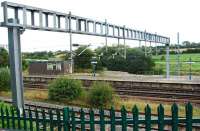 The inaccessible island platform at Norton Bridge station in 2009. The view looks east over the line with the junction off to the left. The access footbridge had been removed.<br><br>[Ewan Crawford 10/09/2009]