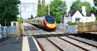 A southbound Pendolino approaches the level crossing at Wedgwood at speed in 2009. At the time there were no stopping services at the station.<br><br>[Ewan Crawford 10/09/2009]