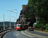 Just south of the city centre, on the east bank of the Vltava, both the road and tram route pass through the short Vyśehradsky Tunnel. In the background the railway running west out of the city can be seen crossing the river. View looks north in 1992.<br><br>[Ewan Crawford //1992]