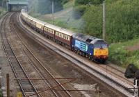 Approaching Bee Lane and adjacent to Farington Curve Junction (on the slow lines) DRS 47818 hauls the 'Northern Belle' charter on the evening of 6 July 2011. On the rear of the train was 47790 in 'Northern Belle' livery.<br>
<br><br>[John McIntyre 06/07/2011]