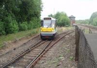 The Parry People Mover Class 139 arrives at Stourbridge Junction passing over the now little used connection to the main line as seen from the end of the platform. In 2010, whilst operating 6 return trips per hour, the two PPMs achieved 99.4% reliability while the flywheel technology means they also used very little fuel. Similar figures are being achieved in 2011 including 100% in April.<br><br>[Mark Bartlett 08/06/2011]