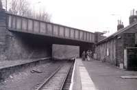 Platform view at Bridge of Weir station in January 1983, the final month of operations over the route, looking north west towards Kilmacolm.<br><br>[Colin Miller /01/1983]