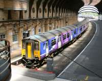 The 12.11 service to Leeds via Harrogate awaits departure time from York's platform 8 on 29 June 2011.<br><br>[John Furnevel 29/06/2011]