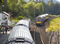 The 12.00 Kings Cross - Inverness <i>Highland Chieftain</i> stands at Pitlochry on 18 July, as the 16.53 Inverness - Edinburgh service arrives from the north.<br><br>[Bill Roberton 18/07/2011]