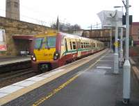 334012 waits in platform 2 at Motherwell on 2 January 2008 with a Glasgow- bound service.<br><br>[John McIntyre 02/01/2008]