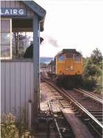 A train leaves the loop and heads north at Lairg in August 1972.<br><br>[Colin Miller /08/1972]