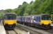 Class 150 DMUs standing at Buxton Station on 4 June 2011.<br><br>[Peter Todd 04/06/2011]