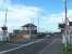 Newsham South level crossing and signal box on the Blyth & Tyne, looking west towards Cramlington on 19 July 2011. Newsham station, which stood less than half a mile to the north, lost its passenger service in November 1964.<br><br>[Colin Alexander 19/07/2011]