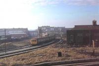 Ex-LMS Liverpool Southport (Class 502) EMU, towards the end of its days, stabled on the old chord outside Southport (Chapel Street) station in February 1980. Beyond the unit the line to Liverpool can be seen. [See image 35057] for the same location in 2011.<br><br>[Mark Bartlett /02/1980]