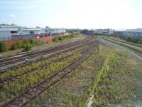 The approaches to Southport station from the Wigan direction in July 2011. [See image 35065] for the same location in 1979. Today the sidings are no longer used and the Central 12 shopping complex has been built on the site of the old coal yard and steam shed. <br><br>[Mark Bartlett 30/07/2011]