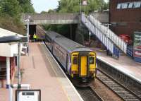 The 14.28 Dunblane - Edinburgh Waverley leaves Falkirk Grahamston on 25 July 2011.<br><br>[John Furnevel 25/07/2011]