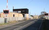 Coopies Lane level crossing and signal box in Morpeth just north of the current ECML station (behind camera to left) and the former Blyth and Tyne station (behind camera to right). View north on 8 November 2007. <br><br>[John Furnevel 08/11/2007]