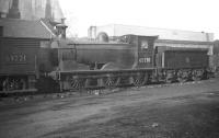 J36 0-6-0 no 65320 'stored' alongside Dunfermline shed in February 1959. <br><br>[Robin Barbour Collection (Courtesy Bruce McCartney) 11/02/1959]