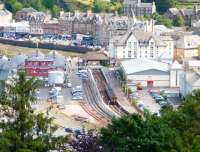 With a belch of diesel fumes the 12.10 service for Glasgow Queen Street gets underway from Oban on 30 July 2011. <br>
<br><br>[John Steven 30/07/2011]