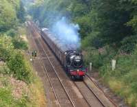 The return <I>Fellsman</I> railtour climbing Hoghton bank as it <br>
runs between the drop off points at Blackburn and Bamber Bridge on 3 August 2011. After the problem last week with 'Scots Guardsman' on this tour, Black 5 no 44932 appears to have put in a faultless performance. <br>
<br><br>[John McIntyre 03/08/2011]