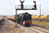 Britannia Pacific no 70000, still carrying no nameplates, passing through Westbury on 3 August 2011 with the 08.05 ex-Poole <I>'Bath Spa Express'</I> on its way to Bristol Temple Meads.<br><br>[Peter Todd 03/08/2011]