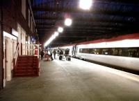 The end of a long day - passengers leaving a London-bound Pendolino at Stoke-on-Trent on 24th April 2011.<br><br>[Ken Strachan 24/04/2011]