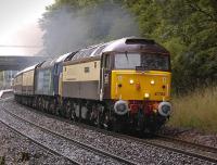 The 1Z36 <I>Northern Belle</I> from London Kings Cross to Inverness, hauled by 47790 'Galloway Princess' + 47818 climbs away from Dalgety Bay on 6 August running about 50 minutes late because of weather-related problems on the ECML.<br><br>[Bill Roberton 06/08/2011]