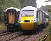 The 14.50 Aberdeen - Kings Cross 'East Coast' service passing the down <I>Northern Belle</I> near Dalgety Bay on 6 August 2011. [See image 35165] <br><br>[Bill Roberton 06/08/2011]