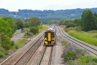 View east as 158951 approaches Pilning station, South Gloucestershire, on 12 July 2011 with a Bristol - Cardiff working heading for the Severn Tunnel.<br><br>[Peter Todd 12/07/2011]