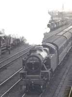 Fairburn 2-6-4T no 42131 takes a train towards Pelaw through Gateshead near the site of Borough Gardens shed, thought to be in the late 1950s. The spire of Newcastle's All Saints Church is visible in the background<br><br>[John Alexander //]