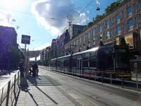 A tram passes Stockholm's famous department store NK on Hamngatan on a beautiful late afternoon in July.<br><br>[Beth Crawford 24/07/2011]