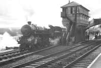 Ivatt 2-6-0 no 43121 occupies the Alston branch platform at Haltwhistle on 26 March 1967 as it prepares to take the BLS/SLS <i>Scottish Rambler No 6</i> on a return trip tover the branch.<br><br>[K A Gray 26/03/1967]