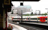 A South West Trains service from the south coast runs non-stop through Vauxhall station in July 2005 as it nears its final destination at Waterloo.<br><br>[John Furnevel 24/07/2005]