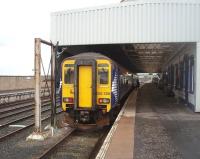 Compared to their English cousins the Corkerhill 156s lead a varied life. One day they are working intensive suburban services around Glasgow and the next off to west coast outposts such as Oban, Mallaig or Stranraer Harbour as seen here. 156506 has connected with the Northern Ireland ferry and will soon head for Glasgow but will be back later in the day with another service. <br><br>[Mark Bartlett 25/05/2011]