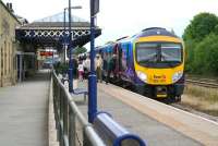 The 15.12 Scarborough - Liverpool Lime Street TransPennine service calls at Malton on 29 June 2011.<br><br>[John Furnevel 29/06/2011]