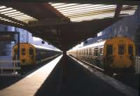 Last days at Holborn Viaduct, with 4EPB and 2HAP units standing at the buffer stops in December 1989. The station finally closed at the end of January 1990 following the opening of the new City Thameslink station on the revived north - south route through Snow Hill tunnel [see image 5243].<br><br>[Ian Dinmore /12/1989]