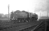 Scene on Blackpool North shed (Talbot Road) on Boxing Day 1967 with Britannia Pacific no 70013 <I>Oliver Cromwell</I> making use of the facilities, having arrived earlier with a football special from Carlisle. (The shed had been officially closed in 1964).<br><br>[Robin Barbour Collection (Courtesy Bruce McCartney) 26/12/1967]