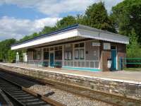 Very tidy looking southbound platform building with waiting room at Abergavenny on 14 July. A former set of lines ran to the rear of the platform, with a platform 3 in existence prior to erection of this building up to the platform edge.<br><br>[David Pesterfield 14/07/2011]