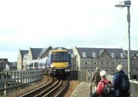 The 12.41 Glasgow Queen Street - Aberdeen edges across the Tay Viaduct in Perth on 15th April 2011<br>
<br><br>[David Spaven 15/04/2011]