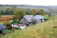 View north west along the Tweed Valley at Thornielee towards Peebles on 7 October 2005. In the foreground is the former Thornielee station, closed in November 1950 and now a private residence.<br><br>[John Furnevel 07/10/2005]