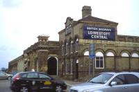 The heavily-rationalised interior of Lowestoft (Central, as was) station is not a place to fill one with confidence that we are living in the age of the train, but the external faade provides a delightful surprise, as this 17th June 2011 shot demonstrates. Is this the oldest extant station name sign on any British station? <br><br>[David Spaven 17/06/2011]