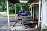 'Victoria' on shed at Torosay about to receive some water treatment. I love the practicalities here - the coaling facilities and shed door.<br><br>[Ewan Crawford /08/2011]