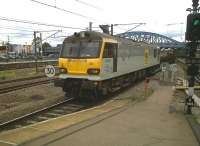 DBS 92034 <I>Kipling</I> proceeding North through Peterborough on 11 August (for Scunthorpe, I believe) with empty steel wagons. A reminder of the days when many trains served heavy industry in Britain.<br><br>[Ken Strachan 11/08/2011]