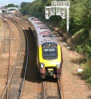 Britain's longest scheduled train service, the CrossCountry 08.20 Aberdeen - Penzance, runs south towards Edinburgh on 22 August 2011, having just crossed the Forth and passed through Dalmeny station in the background. Next stop will be Haymarket, the 11th of 45 intermediate stations served during the train's 13 hour 23 minute marathon journey.<br>
<br><br>[John Furnevel 22/08/2011]