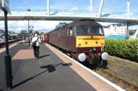 Having just arrived in Stirling station from the south sidings on 20 August, 47804 stands at platform 10 with the stock of the <I>Edinburgh Military Tattoo Statesman</I> railtour.<br><br>[John McIntyre 20/08/2011]