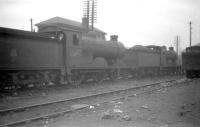D34 no 62495 <I>Glen Luss</I> and D30 no 62439 <I>Father Ambrose</I> on the 'stored locomotive' line at Bathgate in April 1959. [See image 36885]<br><br>[Robin Barbour Collection (Courtesy Bruce McCartney) 21/04/1959]