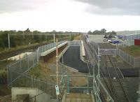 Looking North-West on 24th August 2011, we can see that this part of DIRFT is now well and truly tidied up [see image 34827]. Notice the pile of containers on the left side of the TESCO concrete apron, and the tracks disappearing into the distance and round the corner<br><br>[Ken Strachan 24/08/2011]