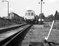 The BLS 'Forth Fife Railtour' on the Alloa Harbour branch on 28 August 1976. View is north, looking back towards Bedford Place, with the Glasshouse Loan Centre (music project and workshop) standing on the left. [Editors note: In response to queries re the dmu destination of 'Cluny Bridge' Bill tells me that, according to 'folklore', when destination blinds were being ordered for dmus, Cluny Bridge showed up in the working timetable (as an ecs destination) so was added to the menu!]<br><br>[Bill Roberton 28/08/1976]