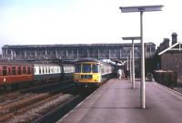 A BR Trans-Pennine DMU calls at Selby in the summer of 1971. Platform view east towards Hull.<br>
<br><br>[David Spaven //1971]