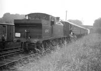 St Margarets C16 4-4-2T no 67492 stands at Ormiston on 6 September 1958 with the SLS <i>Lothian Lines Tour</i>. The special, consisting of 4 ex-LNER coaches, was returning from a visit to the terminus at Macmerry. Ormiston station closed to passengers in April 1933 although the branch remained open for freight as far as Saltoun until 1965.<br><br>[Robin Barbour Collection (Courtesy Bruce McCartney) 06/09/1958]