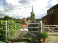 This S&D level crossing is the current limit of operations on the narrow gauge Gartell Light Railway; but there are plans to extend across the road towards Templecombe town. [see image 39871]<br><br>[Ken Strachan 30/05/2011]