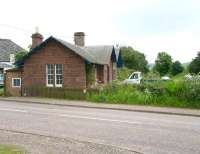 Looking north over the site of the level crossing to the former Meigle station on the Alyth branch in July 2007. The station originally opened as Fullerton in 1861 with the name changed in 1876 (after the station further south originally carrying the name Meigle was renamed Alyth Junction). The branch lost its passenger service in 1951 and closed completely in 1965.<br><br>[John Furnevel 12/07/2007]