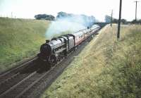 Carlisle Kingmoor's Black 5 no 45152 heads north past Lugton's down distant colour light signal on 22 August 1959. The A735 road bridge spans the line in the background.<br><br>[A Snapper (Courtesy Bruce McCartney) 22/08/1959]