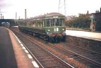 A Corstorphine - North Berwick DMU calls at Joppa on 14 June 1958. Steam still prevails in Portobello yard on the other side of the bridge in the background.<br><br>[A Snapper (Courtesy Bruce McCartney) 14/06/1958]